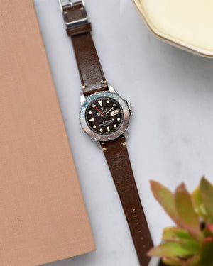 rolex GMT master 1675 with brown watch strap