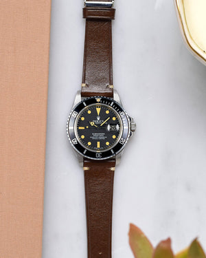 rolex submariner with brown leather watch strap